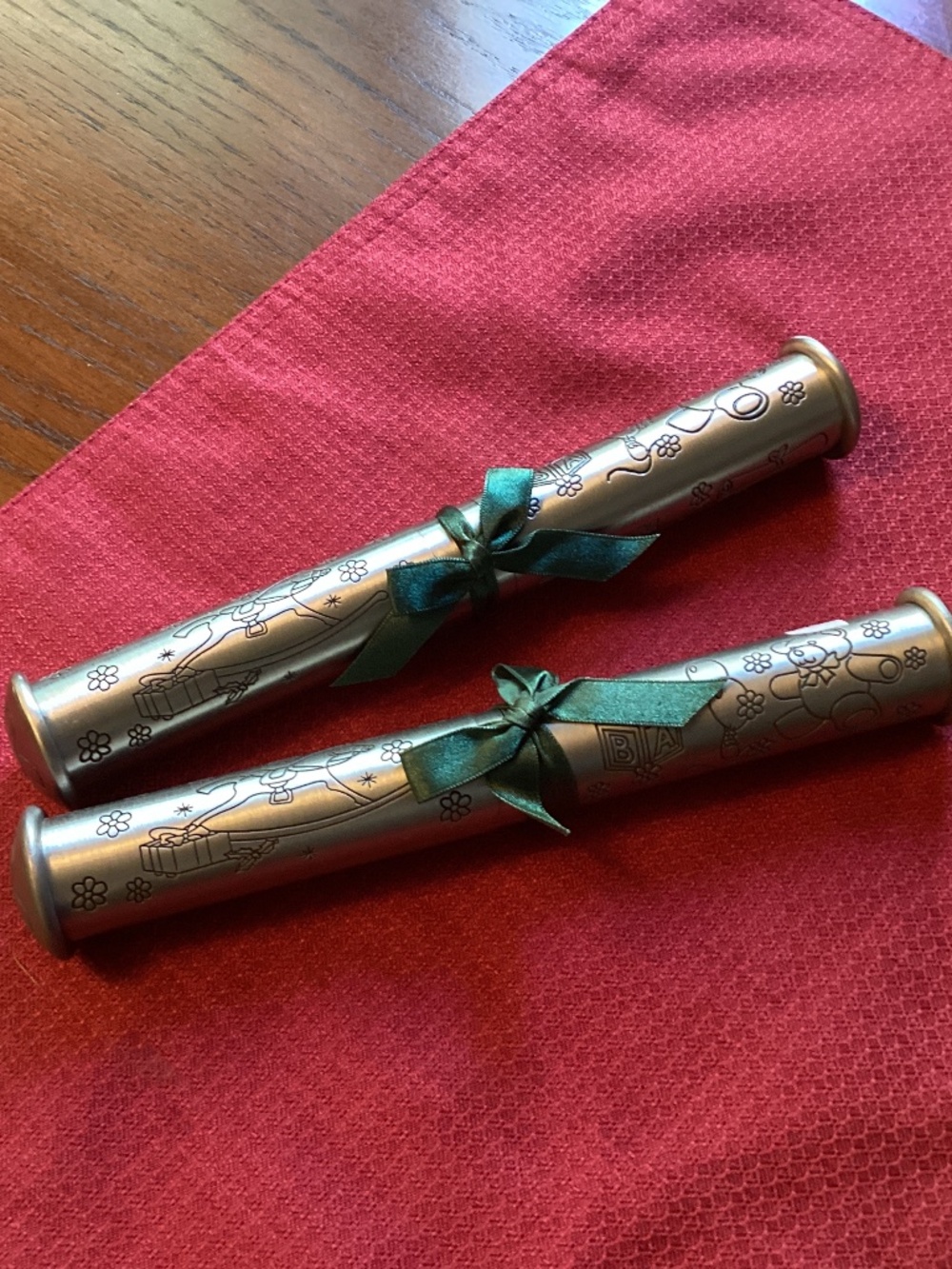 Two Metal tubes for storing or displaying Christening or birth certificates